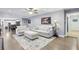 Spacious living room featuring hardwood floors, neutral decor, and an open layout at 1280 Sherry Dr, Alpharetta, GA 30009