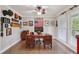 Stylish home office featuring a classic wooden desk and plenty of natural light at 1280 Sherry Dr, Alpharetta, GA 30009
