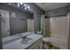 A full bathroom with a shower-tub and a single sink vanity at 1959 Christian Circle, Conyers, GA 30013