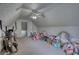 A spacious room with vaulted ceilings, ceiling fan and doorway at 1959 Christian Circle, Conyers, GA 30013