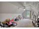 A spacious room with vaulted ceilings, ceiling fan and large window at 1959 Christian Circle, Conyers, GA 30013