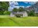 Charming single-story home boasts a well-manicured lawn and inviting front porch at 1959 Christian Circle, Conyers, GA 30013