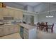 Open kitchen featuring granite countertops and stainless steel appliances, attached to an open dining area at 1959 Christian Circle, Conyers, GA 30013