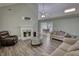 Cozy living room featuring a fireplace, gray walls, hard surface flooring, and comfortable seating at 1959 Christian Circle, Conyers, GA 30013