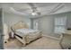 Main bedroom with trey ceiling, crown molding, carpet, and neutral colors at 1959 Christian Circle, Conyers, GA 30013