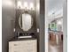 Powder room with updated vanity and stylish lighting at 212 Fernwood Pl, Woodstock, GA 30188