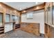 Custom closet featuring wood cabinetry, drawers, and shelves with diamond patterned floor at 212 Fernwood Pl, Woodstock, GA 30188
