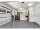 A tidy garage featuring custom cabinets, a sink, and ample space for parking and storage, blending utility with design at 212 Fernwood Pl, Woodstock, GA 30188