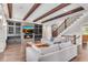Bright living room with coffered ceiling, fireplace and built-in bookshelves at 212 Fernwood Pl, Woodstock, GA 30188