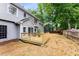 A backyard view showing a new wooden deck and fenced yard at 3285 Country Walk Dr, Powder Springs, GA 30127