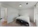 Neutral bedroom featuring carpeted floors and neutral walls with plenty of natural light and neutral decor at 3285 Country Walk Dr, Powder Springs, GA 30127