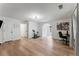 Open bonus room with wood-look floors and an archway that fills the room with plenty of sunlight at 3285 Country Walk Dr, Powder Springs, GA 30127