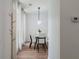 Cozy dining area with contemporary lighting and plenty of natural light at 3285 Country Walk Dr, Powder Springs, GA 30127