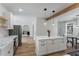 Open concept kitchen and dining area with an island and lots of counter space at 3285 Country Walk Dr, Powder Springs, GA 30127