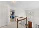 Bright foyer featuring staircase, upper window and chandelier at 3472 Honeycomb Se Dr, Conyers, GA 30094