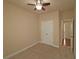Spacious bedroom with double closet, neutral walls, carpet and ceiling fan at 4024 Broadmoor Sw Ct, Austell, GA 30106