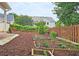 Spacious backyard garden with thriving plants and an irrigation system at 4024 Broadmoor Sw Ct, Austell, GA 30106