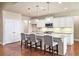 Kitchen featuring granite countertops, stainless steel appliances, and a central island with barstool seating at 4024 Broadmoor Sw Ct, Austell, GA 30106