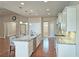 Spacious kitchen featuring granite countertops, stainless steel appliances, and a central island with barstool seating at 4024 Broadmoor Sw Ct, Austell, GA 30106