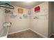 Spacious walk-in closet featuring wire shelving, offering plenty of room for clothes and accessories at 4024 Broadmoor Sw Ct, Austell, GA 30106