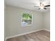 Bedroom featuring hardwood floors, natural light, and a ceiling fan at 12 Dunwoody Springs Dr # 12, Atlanta, GA 30328