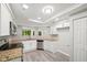 Updated kitchen with granite countertops, stainless steel appliances, white cabinets, and ample natural light at 12 Dunwoody Springs Dr # 12, Atlanta, GA 30328