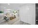 Open living room with a light gray color palette and sliding door closet at 12 Dunwoody Springs Dr # 12, Atlanta, GA 30328
