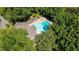 Aerial view showcasing pool amenities surrounded by lush greenery, offering a resort-like experience at 12 Dunwoody Springs Dr # 12, Atlanta, GA 30328
