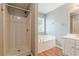 Bathroom with a separate shower and tub, plus a vanity at 150 Alton Cir, Villa Rica, GA 30180