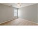 Neutral bedroom with carpet, ceiling fan, and a window at 150 Alton Cir, Villa Rica, GA 30180