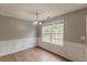Bright dining area with a large window and decorative wall trim at 150 Alton Cir, Villa Rica, GA 30180