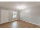 Spacious dining room with tile floors and a decorative chandelier at 150 Alton Cir, Villa Rica, GA 30180