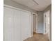 Upstairs hallway featuring carpet and multiple closets at 150 Alton Cir, Villa Rica, GA 30180