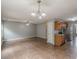 Open-concept living room and kitchen with tile flooring and modern appliances at 150 Alton Cir, Villa Rica, GA 30180