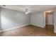 Tile living room area with natural light and ceiling fan at 150 Alton Cir, Villa Rica, GA 30180