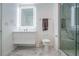 Modern bathroom featuring a marble floor, sleek vanity, and glass-enclosed shower at 250 Pharr Ne Rd # 1112, Atlanta, GA 30305