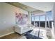 Inviting living room with ample natural light and city views, complemented by modern decor at 250 Pharr Ne Rd # 1112, Atlanta, GA 30305