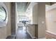 Bright living space with a bar counter, hardwood floors, and scenic city views at 250 Pharr Ne Rd # 1112, Atlanta, GA 30305
