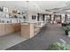 Spacious lounge area with a stylish bar, ample seating, and modern lighting fixtures at 250 Pharr Ne Rd # 1112, Atlanta, GA 30305
