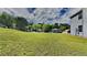 Expansive front yard showcasing well-maintained lawn and mature trees at 4706 Derby Loop, Fairburn, GA 30213