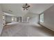 Bright main bedroom with plush carpet, vaulted ceiling, and generous open space at 4706 Derby Loop, Fairburn, GA 30213