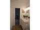 Bright bathroom features a vanity with white countertop and decorated walls at 8 Ripplewood Trl, Euharlee, GA 30145
