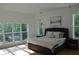 Bright bedroom features large windows and hardwood floors at 8 Ripplewood Trl, Euharlee, GA 30145