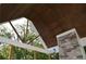 Wood paneled ceiling with a skylight and a stone fireplace on a deck at 8 Ripplewood Trl, Euharlee, GA 30145