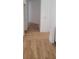 Bright hallway featuring hardwood floors at 8 Ripplewood Trl, Euharlee, GA 30145