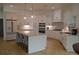 Spacious kitchen featuring a large island, stainless steel appliances, and an open layout at 8 Ripplewood Trl, Euharlee, GA 30145