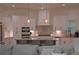 Modern kitchen with stainless steel appliances, marble countertops, and pendant lighting at 8 Ripplewood Trl, Euharlee, GA 30145