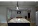 Open living area with kitchen island, pool table, and modern lighting at 8 Ripplewood Trl, Euharlee, GA 30145