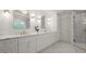 Elegant bathroom featuring double sinks, marble counters, and modern fixtures at 1200 Bay Pointe Terr Ter, Alpharetta, GA 30005