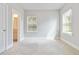 Serene bedroom with natural light streaming through windows and a glimpse into an attached bath at 1405 Attwater Dr, Atlanta, GA 30316